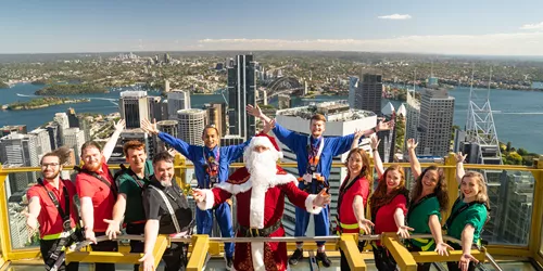 Santa Joined By Cantabile Choir And SKYWALK Guides 268M Above Sydney