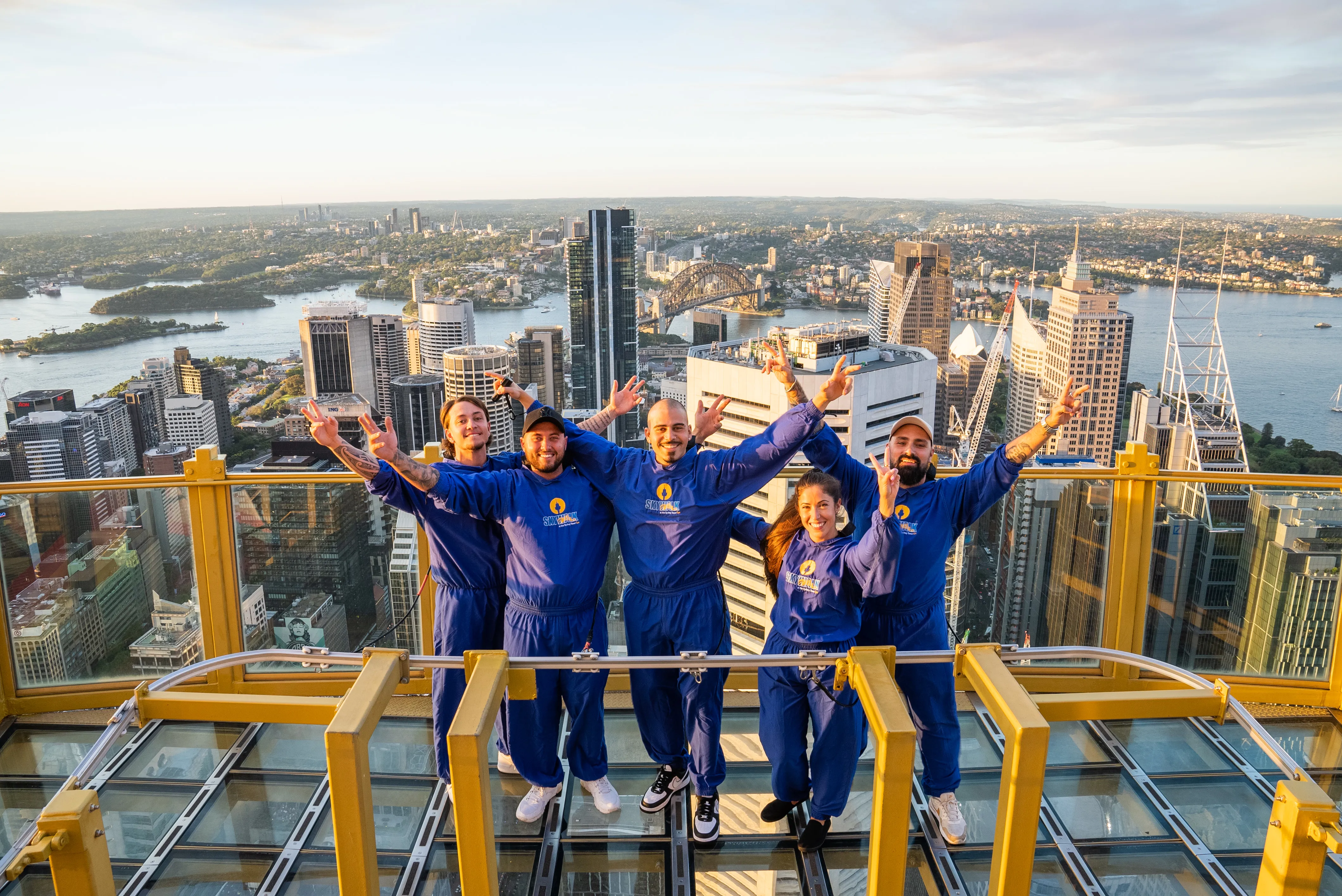 Bondi Ink SKYWALK L R Zachary Spiros Aiden Prince Christopher Moit Cristina Martinez Aaron Prego ARMS UP